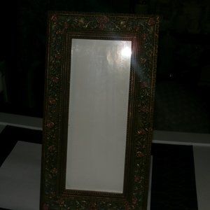 heavy frame with glass. wall or desk.